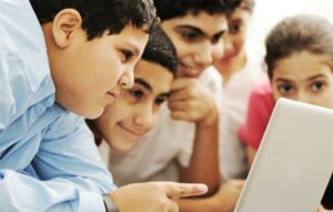 Young students with computer